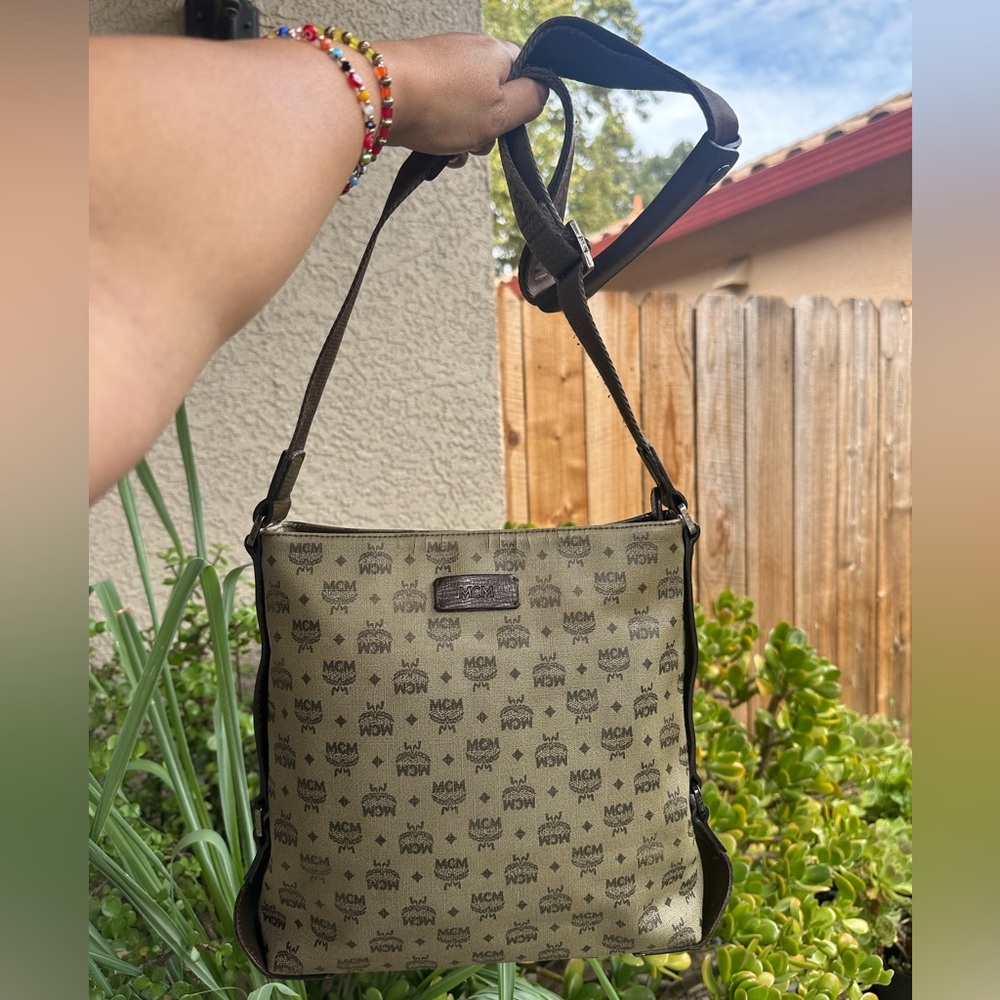 MCM Messenger Bag in Brown Monogram crossbody Bag - cracking on opening area